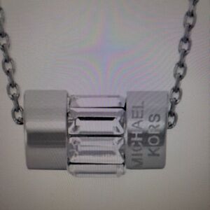 NWT Michael Kors Silver tone crystal baguette barrel pendant necklace